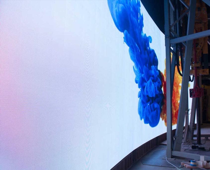 blue smoke on curved led screen in museum